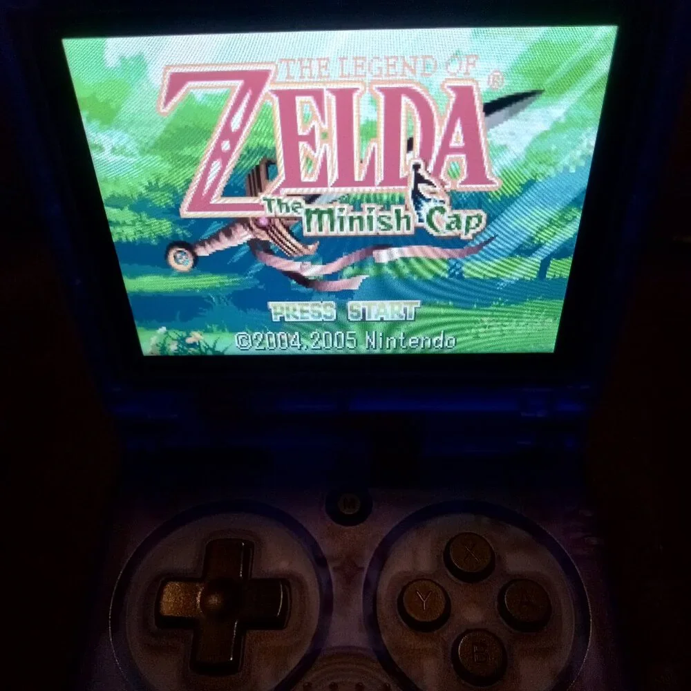 Pre-Loaded Anbernic RG35XXSP blue transparent with most retro platforms 64gb